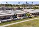 Stunning aerial view showcases modern desert home with meticulously landscaped yard and golf course backdrop at 7856 E Via Marina --, Scottsdale, AZ 85258