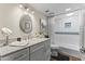 Bright bathroom featuring granite countertops, white subway tile, and modern fixtures in a well-lit space at 7856 E Via Marina --, Scottsdale, AZ 85258