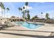 Expansive community pool with lounge chairs, umbrellas, and poolside amenities at 7856 E Via Marina --, Scottsdale, AZ 85258