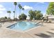 Large community pool with lounge chairs and well-maintained landscaping at 7856 E Via Marina --, Scottsdale, AZ 85258