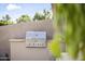 Close-up of an outdoor grill with granite countertops and a cactus at 7856 E Via Marina --, Scottsdale, AZ 85258
