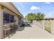 Large patio with outdoor seating, bar area, and views of the manicured community greenspace at 7856 E Via Marina --, Scottsdale, AZ 85258
