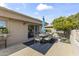 Outdoor patio with an umbrella table and mature lemon tree at 7856 E Via Marina --, Scottsdale, AZ 85258