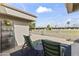 Charming patio with comfortable seating, views of the well-manicured green spaces and neighborhood at 7856 E Via Marina --, Scottsdale, AZ 85258