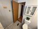Bathroom features a toilet and cabinet at 8103 E Southern Ave # 157, Mesa, AZ 85209