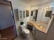Bathroom with updated lighting, vanity, and toilet at 8103 E Southern Ave # 157, Mesa, AZ 85209