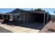 Charming single-story home with a covered carport and low-maintenance landscaping at 8103 E Southern Ave # 157, Mesa, AZ 85209