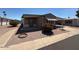 Charming single-story home with a covered patio and easy-to-maintain gravel landscaping at 8103 E Southern Ave # 157, Mesa, AZ 85209