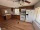 Cozy kitchen with modern appliances, hardwood floors, and ample cabinetry at 8103 E Southern Ave # 157, Mesa, AZ 85209