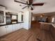 Open concept kitchen with modern appliances, hardwood floors, and ample cabinetry at 8103 E Southern Ave # 157, Mesa, AZ 85209