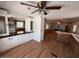 Open concept kitchen with modern appliances, hardwood floors, and ample cabinetry at 8103 E Southern Ave # 157, Mesa, AZ 85209