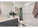 Clean bathroom featuring white subway tile, quartz countertops, and modern fixtures at 8149 E Petunia Ave # 1057, Mesa, AZ 85212