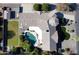 Aerial view showcasing the property's layout, including the pool, patio, and manicured landscaping at 8441 W Foothill Dr, Peoria, AZ 85383