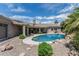A swimming pool in the backyard provides relief from the sun and a great view at 8441 W Foothill Dr, Peoria, AZ 85383