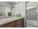 Bathroom with a decorative granite counter and shower at 8441 W Foothill Dr, Peoria, AZ 85383