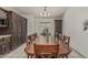 Elegant dining room featuring a large table, ample seating, and custom built-in storage units at 8441 W Foothill Dr, Peoria, AZ 85383