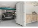 Spacious garage with epoxy flooring, built-in cabinets, and room for multiple vehicles at 8441 W Foothill Dr, Peoria, AZ 85383
