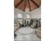 Spacious living room featuring high ceilings, beautiful flooring, and an abundance of natural light at 8441 W Foothill Dr, Peoria, AZ 85383