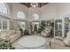 Spacious living room with high ceilings, large windows, and stylish furnishings creating an elegant atmosphere at 8441 W Foothill Dr, Peoria, AZ 85383