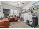 Office space with vaulted ceilings, art, desk, and sewing machine at 8441 W Foothill Dr, Peoria, AZ 85383