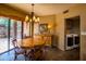 Light-filled dining area with sliding glass door, laundry access, and natural light at 8502 E Cave Creek Rd # 61, Carefree, AZ 85377