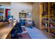 Functional home office with built-in desk, shelving, and comfortable seating at 8502 E Cave Creek Rd # 61, Carefree, AZ 85377