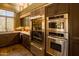 Gourmet kitchen featuring stainless steel appliances and natural light at 8502 E Cave Creek Rd # 61, Carefree, AZ 85377