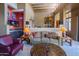 Spacious living area with comfortable seating, lamps, and adjacent wet bar at 8502 E Cave Creek Rd # 61, Carefree, AZ 85377