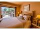 Inviting bedroom featuring outdoor views, comfortable decor, and neutral tones at 8502 E Cave Creek Rd # 61, Carefree, AZ 85377