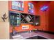 Stylish wet bar with custom cabinetry, wine storage, and unique lighting at 8502 E Cave Creek Rd # 61, Carefree, AZ 85377