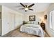 Bedroom boasting neutral walls, sliding closet doors, and a cozy atmosphere at 9226 W Topeka Dr, Peoria, AZ 85382