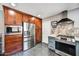 Beautiful kitchen with modern appliances and custom cabinetry at 9226 W Topeka Dr, Peoria, AZ 85382