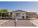 Single-story home with carport and desert landscaping at 931 S 91St Pl, Mesa, AZ 85208