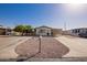 Charming single-story home featuring desert landscaping, carport, and appealing facade at 931 S 91St Pl, Mesa, AZ 85208