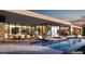Stunning pool with lounge chairs and covered outdoor living area at 9828 E Running Deer Trl, Scottsdale, AZ 85262