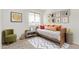 Charming bedroom featuring a daybed, playful decor, and soft carpet flooring, creating a cozy atmosphere at 11501 N Pablo St, El Mirage, AZ 85335