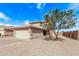 Charming two-story home featuring a two-car garage, desert landscaping, and a classic tile roof at 11501 N Pablo St, El Mirage, AZ 85335