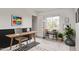 Stylish home office with a large window, modern furniture, and decorative accents at 11501 N Pablo St, El Mirage, AZ 85335