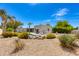 An expansive backyard features low-maintenance desert landscaping, and a barbecue, perfect for outdoor enjoyment at 13238 N 78Th St, Scottsdale, AZ 85260