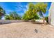 Spacious backyard with desert landscaping, providing a blank canvas for outdoor living at 13238 N 78Th St, Scottsdale, AZ 85260