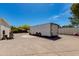 Backyard with trailer or moving container, desert landscaping, and stamped concrete at 13238 N 78Th St, Scottsdale, AZ 85260