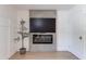 Bedroom with fireplace, wood floors, and natural light at 13238 N 78Th St, Scottsdale, AZ 85260