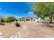 Picturesque home with well-maintained landscaping, featuring a garage and a beautiful stone facade at 13238 N 78Th St, Scottsdale, AZ 85260