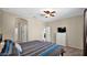 Cozy main bedroom with a dresser and ensuite bathroom at 13256 N 153Rd Ln, Surprise, AZ 85379