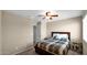 Bedroom featuring a bed, neutral walls, and a ceiling fan at 13256 N 153Rd Ln, Surprise, AZ 85379
