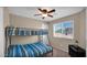 Bedroom featuring a bunk bed, neutral walls, and a window at 13256 N 153Rd Ln, Surprise, AZ 85379