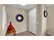 Inviting foyer with neutral walls, a decorative mirror, and tiled flooring, creating a welcoming entrance at 13256 N 153Rd Ln, Surprise, AZ 85379