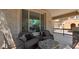 Cozy front porch features comfortable seating, offering a relaxing outdoor space at 13256 N 153Rd Ln, Surprise, AZ 85379