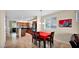 Open-concept kitchen and dining area features modern appliances, and granite countertops at 13256 N 153Rd Ln, Surprise, AZ 85379