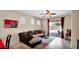 Comfortable living room with stylish décor, leading to a patio for outdoor relaxation at 13256 N 153Rd Ln, Surprise, AZ 85379